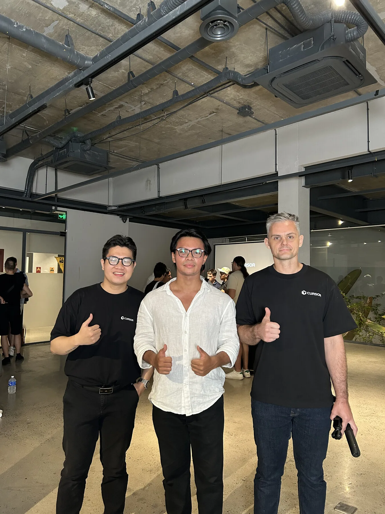 Nick Miller with community members after the Cursor Da Nang Meetup